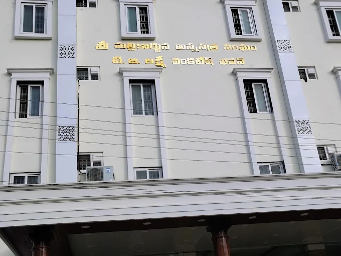 Upper floors and entrance canopy of the building